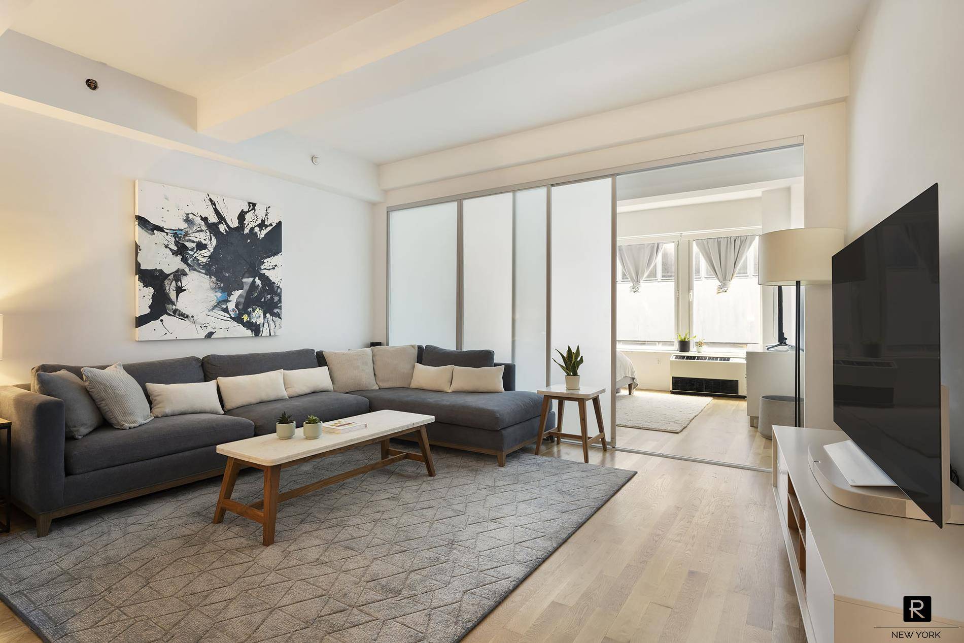 This bright and spacious loft home on the tenth floor is located in a prime, full service condominium in the heart of the Financial District, at 90 William Street.