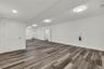 Finished below grade area featuring wood finished floors