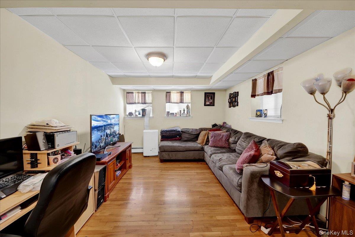 Living room with hardwood flooring in in-law