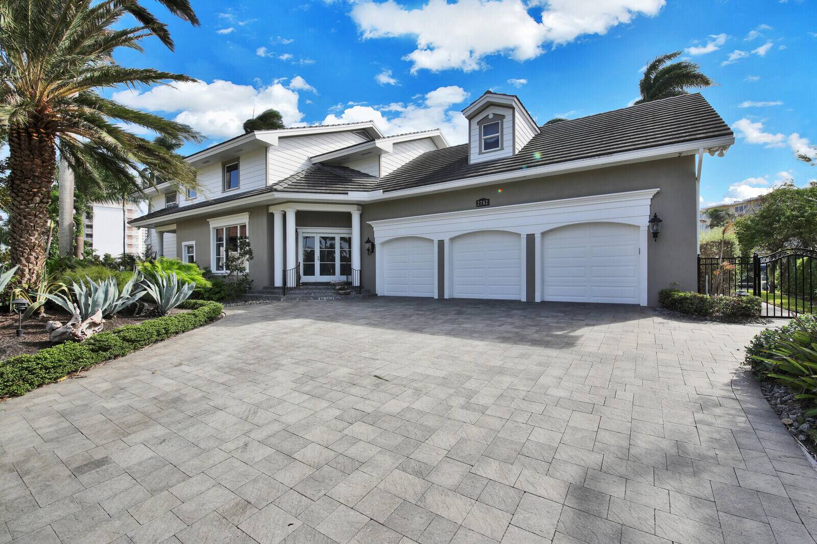 Commonly known by locals as ''The White House Of Pompano Beach'', this stunning corner lot is on the DIRECT INTRACOASTAL and was FULLY renovated in 2011 from top to bottom.