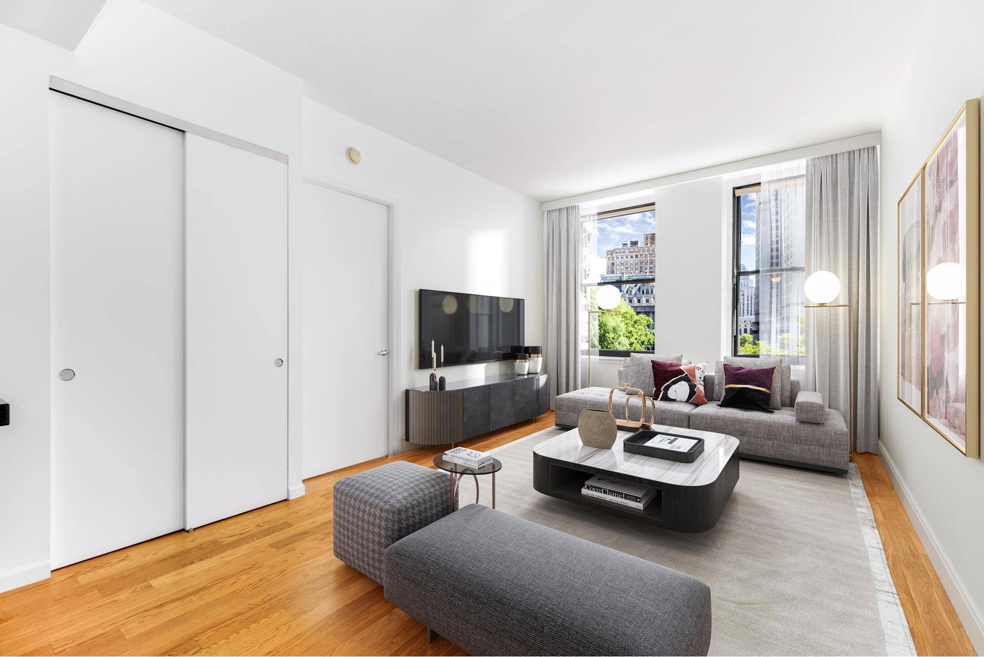 This bright and spacious, sun filled apartment has views of City Hall Park from its large, north facing windows.
