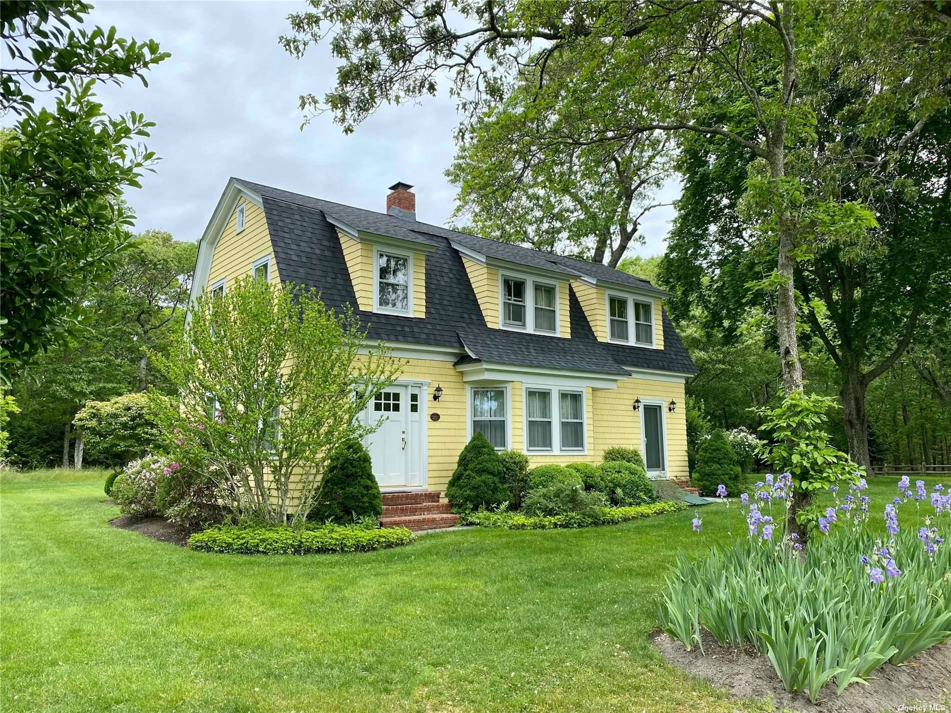 Idyllic Quogue South Rental This bright, fully renovated farmhouse in the heart of Quogue sits adjacent to 14 acres of private woodlands.