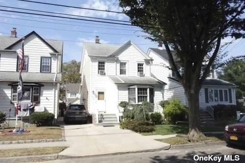 Fully renovated detached colonial house with new kitchen, bathrooms and hardwood floor throughout with many extras