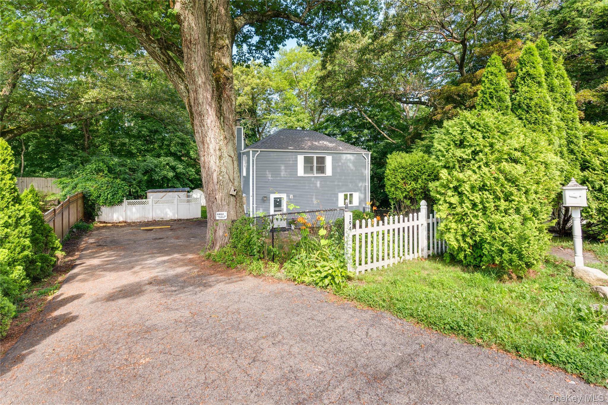 Experience the charm of this beautiful Colonial style home, perfectly situated on a peaceful cul de sac.