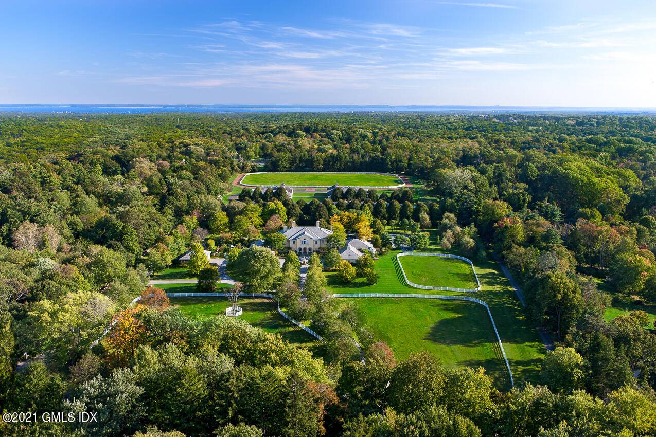AMID THE PASTORAL BEAUTY OF GREENWICH'S GREAT ESTATES, ''OLDFIELD FARM'' IS AN EQUESTRIAN ESTATE WITHOUT PEER.