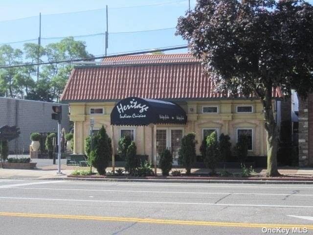 Discover potential at 2024 Hillside Ave, New Hyde Park, NY 11580 the former Indian restaurant with a spacious lot 100'x125' and over 20 parking spaces !