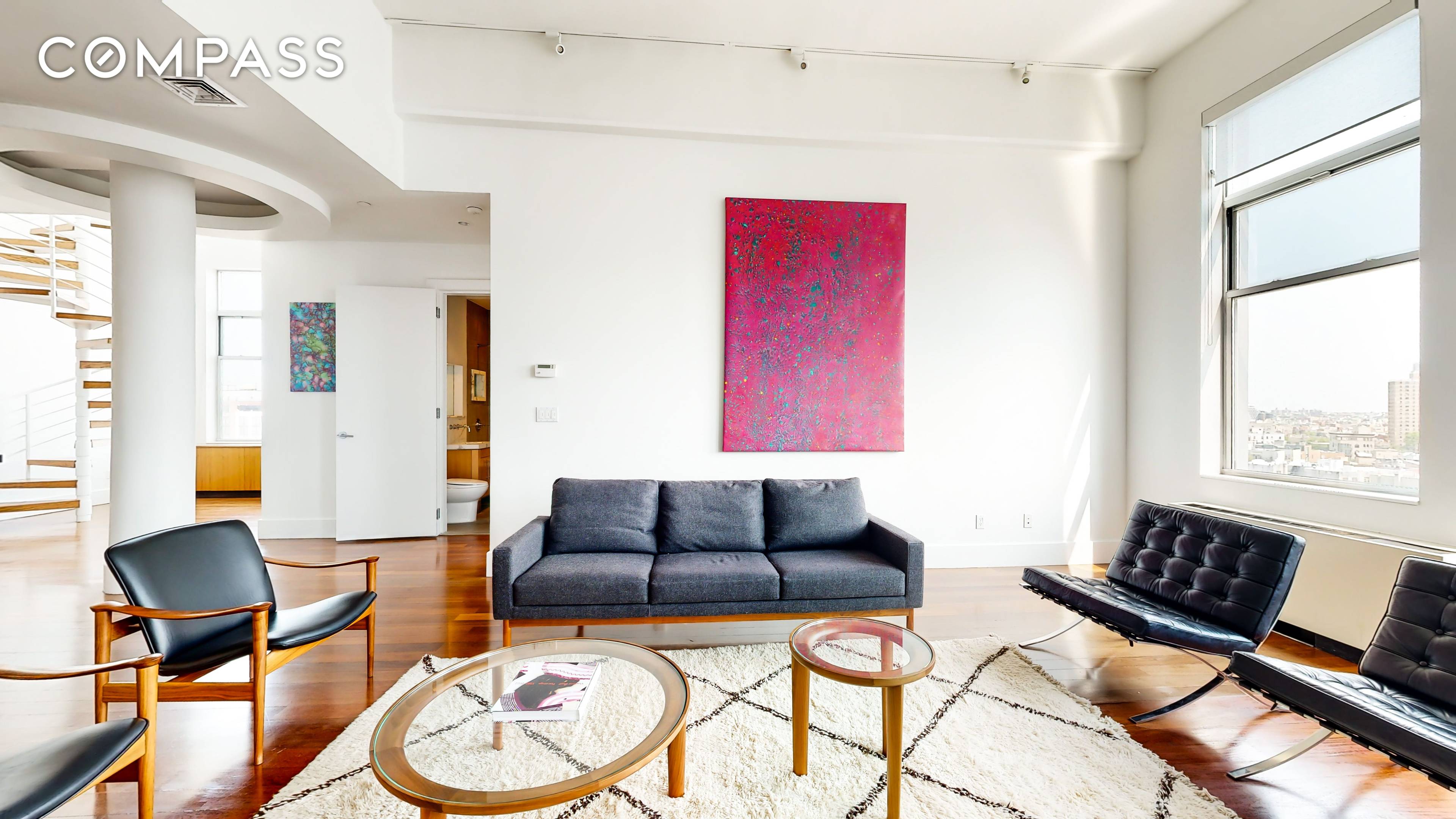 Discover the epitome of modern luxury living in this two bedroom loft style apartment with a private terrace, nestled within the iconic Gretsch building in Williamsburg.