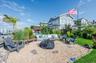 View of yard with a patio area and an outdoor living space with a fire pit
