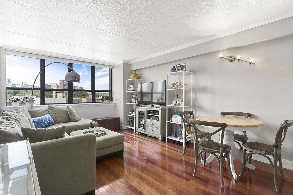 This oversized one bedroom features stunning views of Morningside Park, the Cathedral of St.