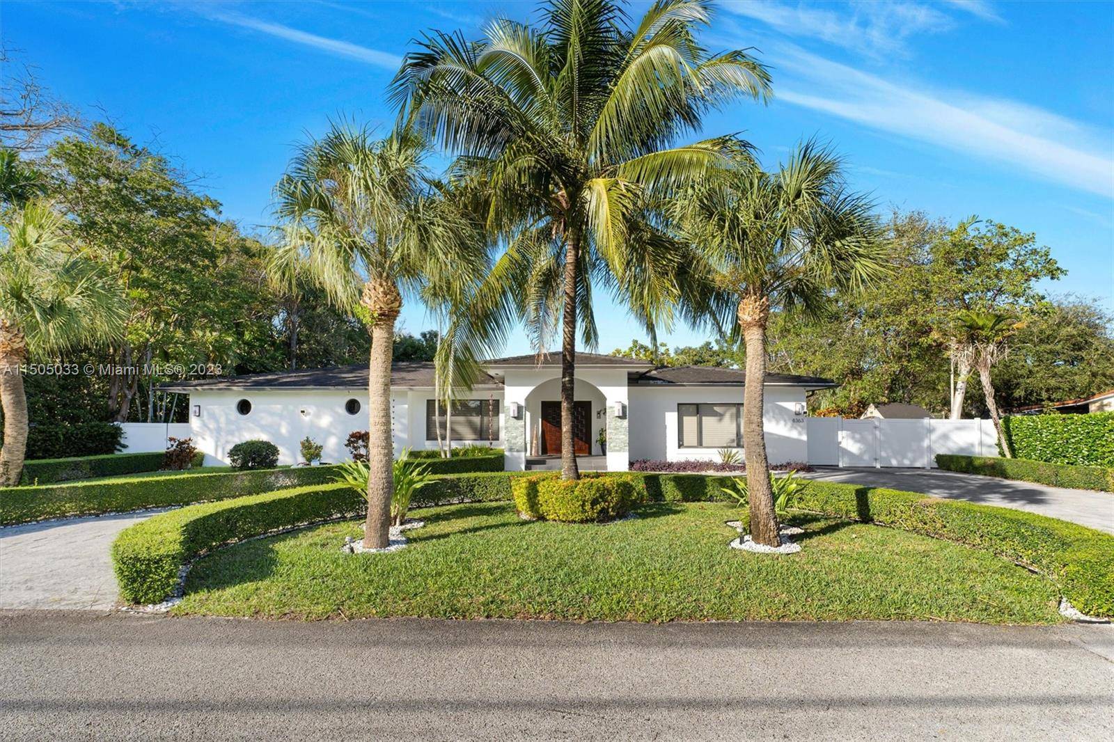 8363 SW 98th St, Miami, FL 33156, Offers a spacious home with five bedrooms and six bathrooms that offers ample living space for a prominent family.