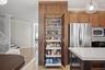 Pantry features pull-out shelving