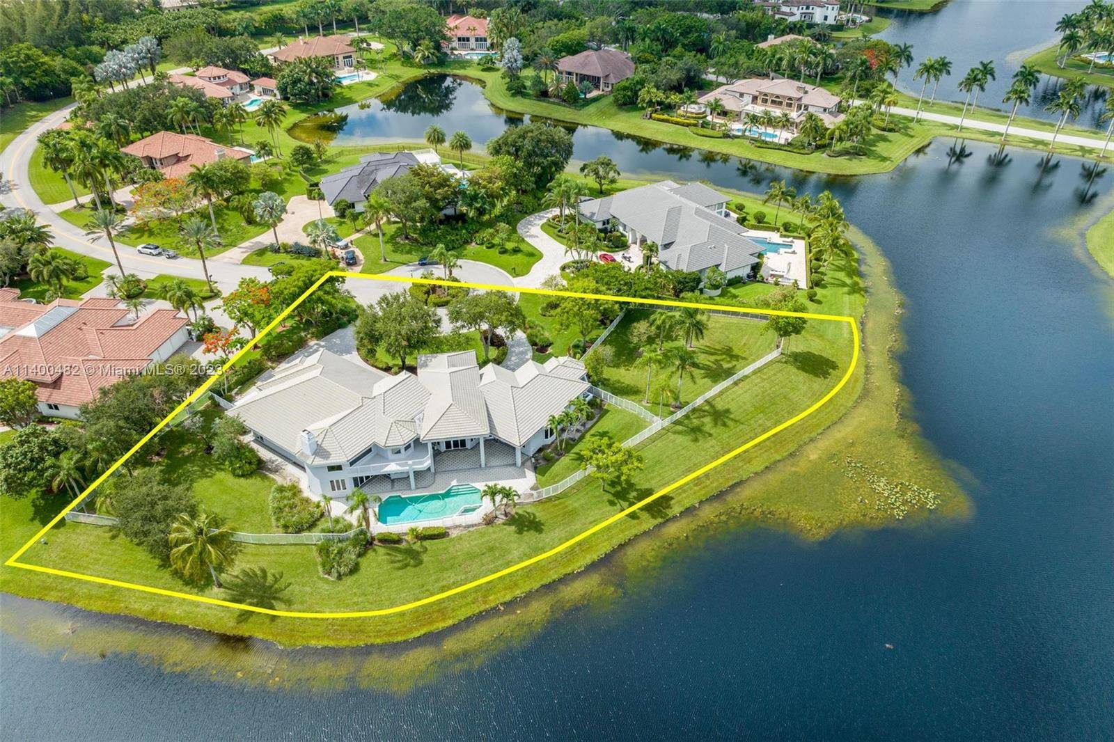 Expansive waterfront custom built estate in the prestigious guard gated Windmill Ranch Estates.