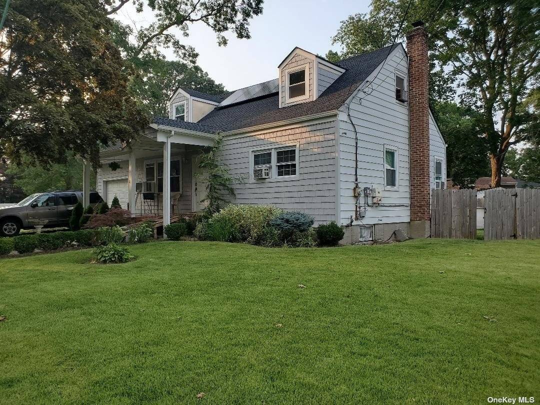 GREAT LARGE CAPE MOSTLY REDONE NEW WINDOWS, BATHROOMS, ROOF, SIDDING, KITCHEN PARTIAL FINISHED BASEMENT WITH OUTSIDE ENTRACE.