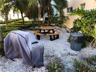 One of the picnic areas at Barefoot Beach that offers a gas grill and picnic tables. There are several picnic areas throughout the property