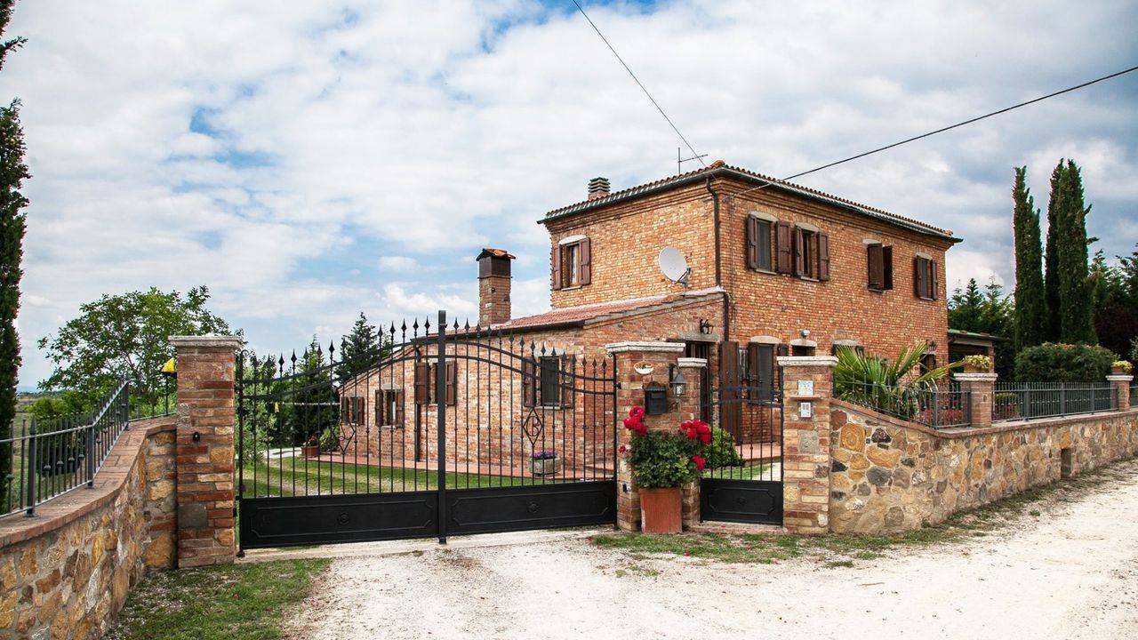 Restored rural property in Tuscany for sale with views over Montepulciano and Torrita di Siena. The house is set in hillside position