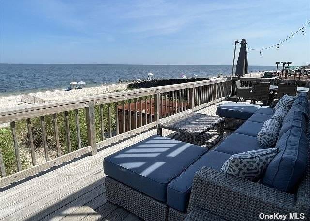In this Luxurious home, you'll have front row seats to some incomparable Long Island Sounds sunsets.