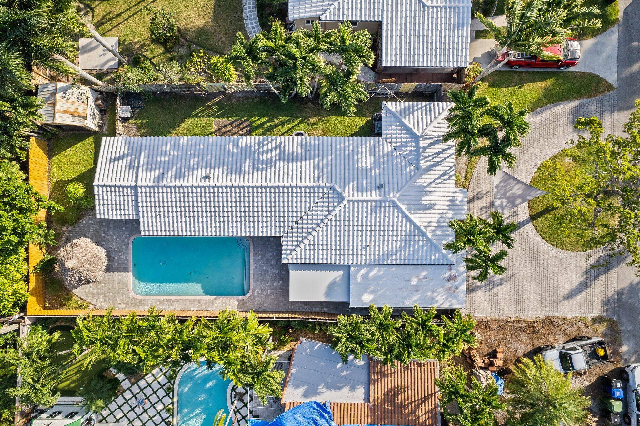 4 5 bedroom, 2 bathroom Pool home situated on a PRIME 7, 433 square foot fully fenced Private lot in the sought after community of Poinsettia Heights in Fort Lauderdale.