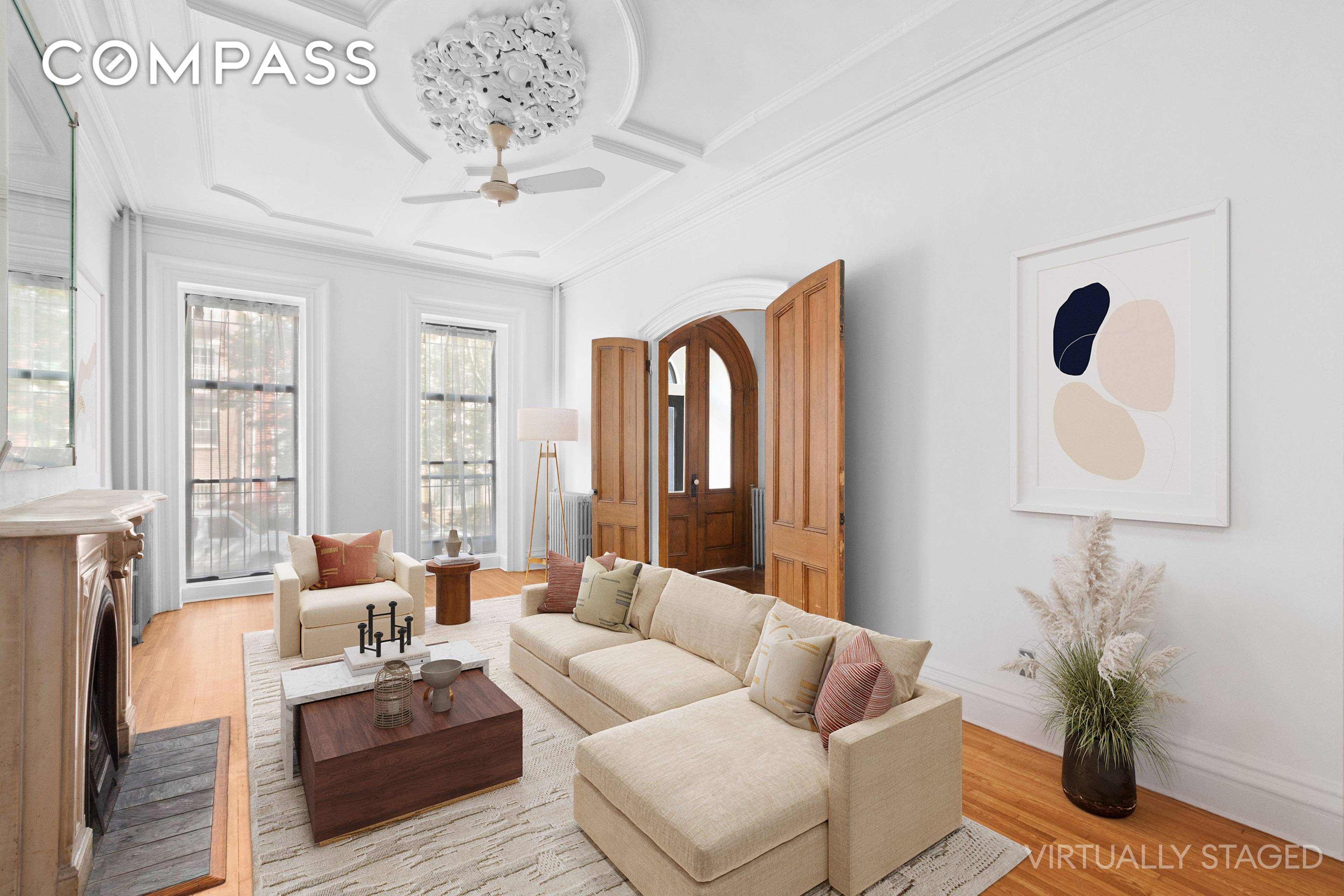Housed in a circa 1860 s Italianate North Slope brick two family townhouse, this dashing upper triplex effortlessly blends period details with abundant space, light, and modern style and amenities.