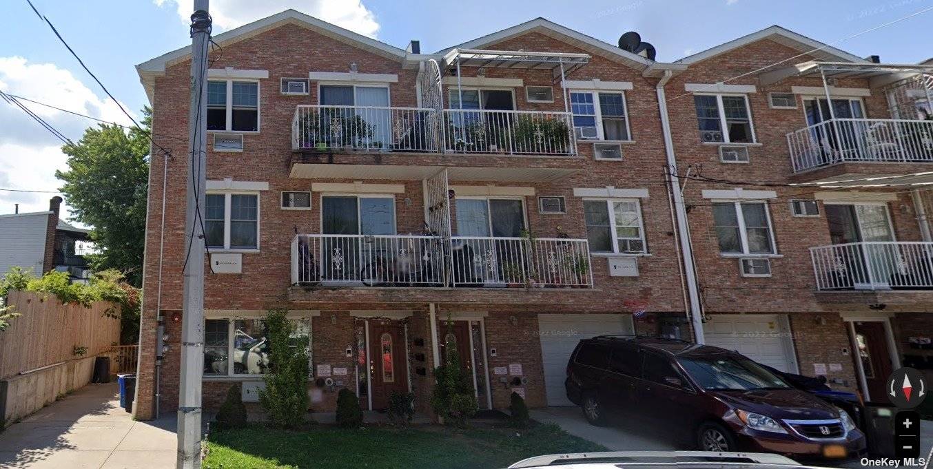 Great Brick Semi Attached Legal 3 Family House On Prime Location In The Heart of Woodside.