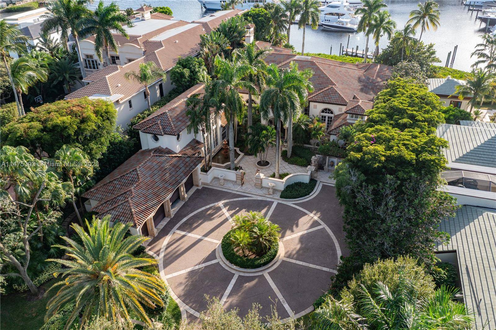 Experience the epitome of opulence in this substantially remodeled 7, 248 SF Mediterranean Waterfront Estate in Admirals Cove.