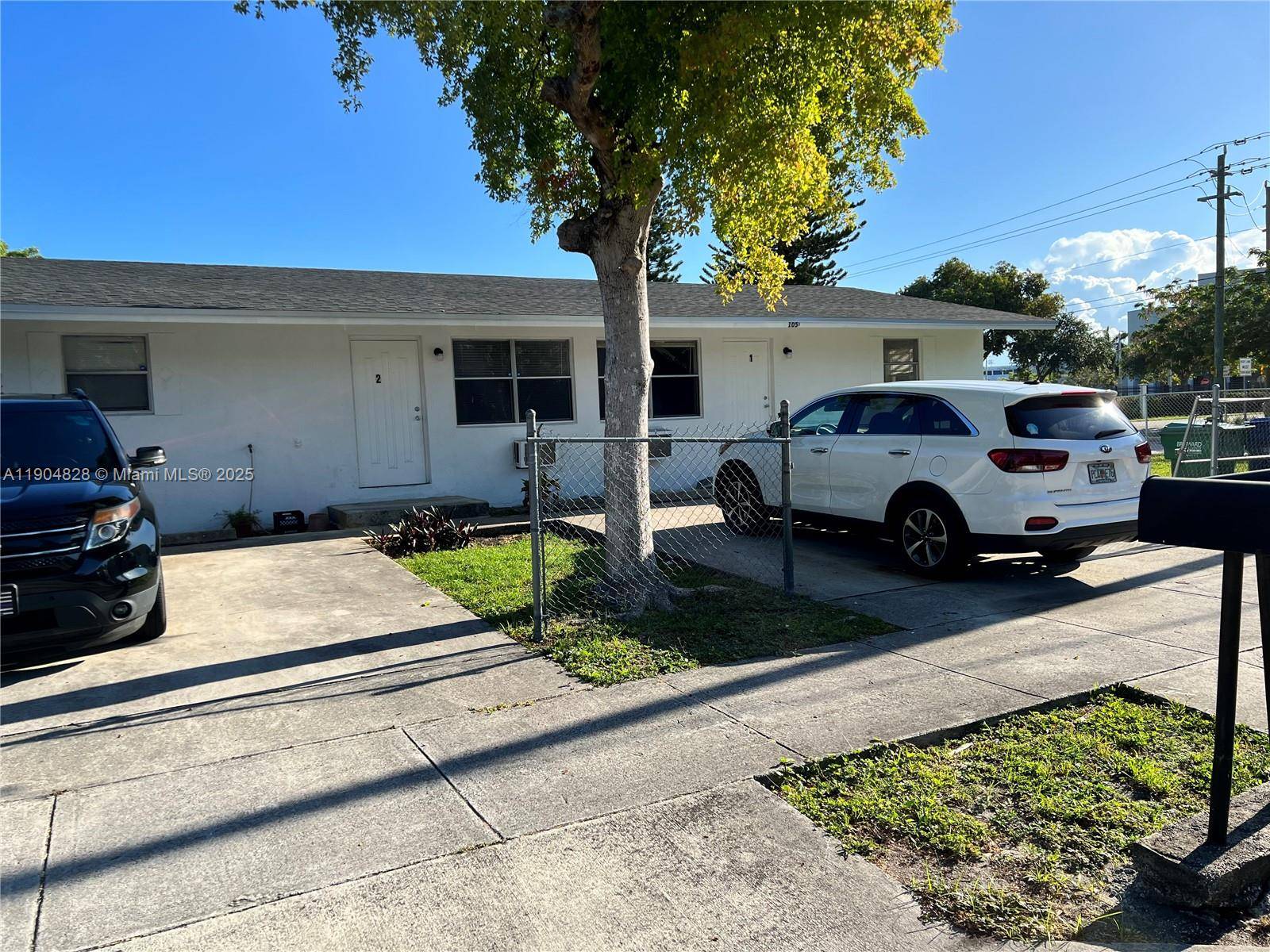 FULLY REMODELED DUPLEX WITH RECENTLY NEW ROOF 2023 WITH NEW KITCHENS APPLIANCES NEW FLOORING AND MORE.