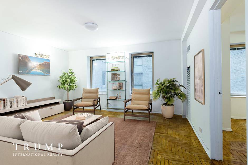 Live on Central Park South in this true one bedroom 1.