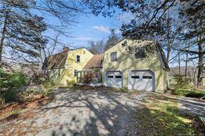 Welcome to this versatile two family colonial home, offering incredible rental potential with a separate in law suite !