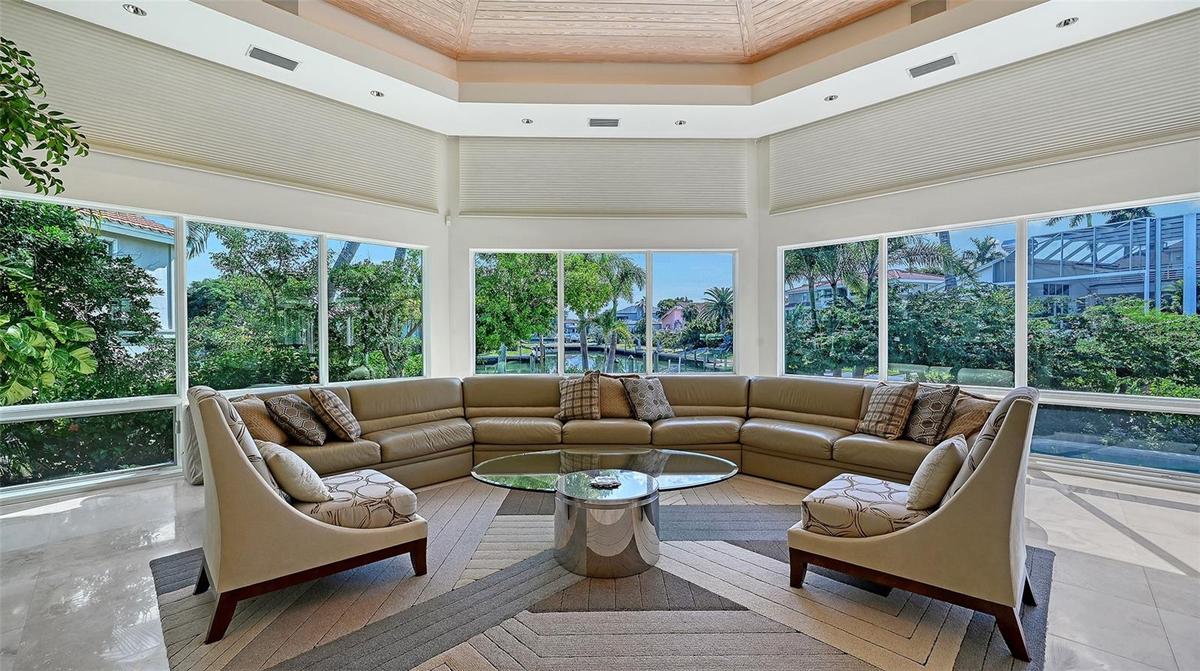 Immense Great room offering serene, open-water views of the canal.