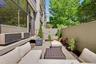 One of the home’s most distinctive features is its exceptional private outdoor space, a rare amenity available to only a select few residences in the