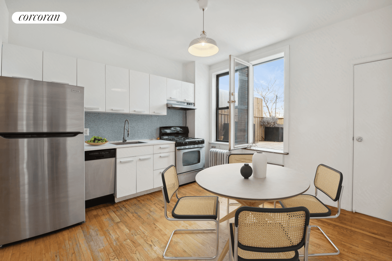 Nestled in the vibrant Williamsburg's Southside, this charming and large 4 Unit brick Townhouse presents an exceptional canvas allowing for maximum flexibility for its owner with the potential of multi ...