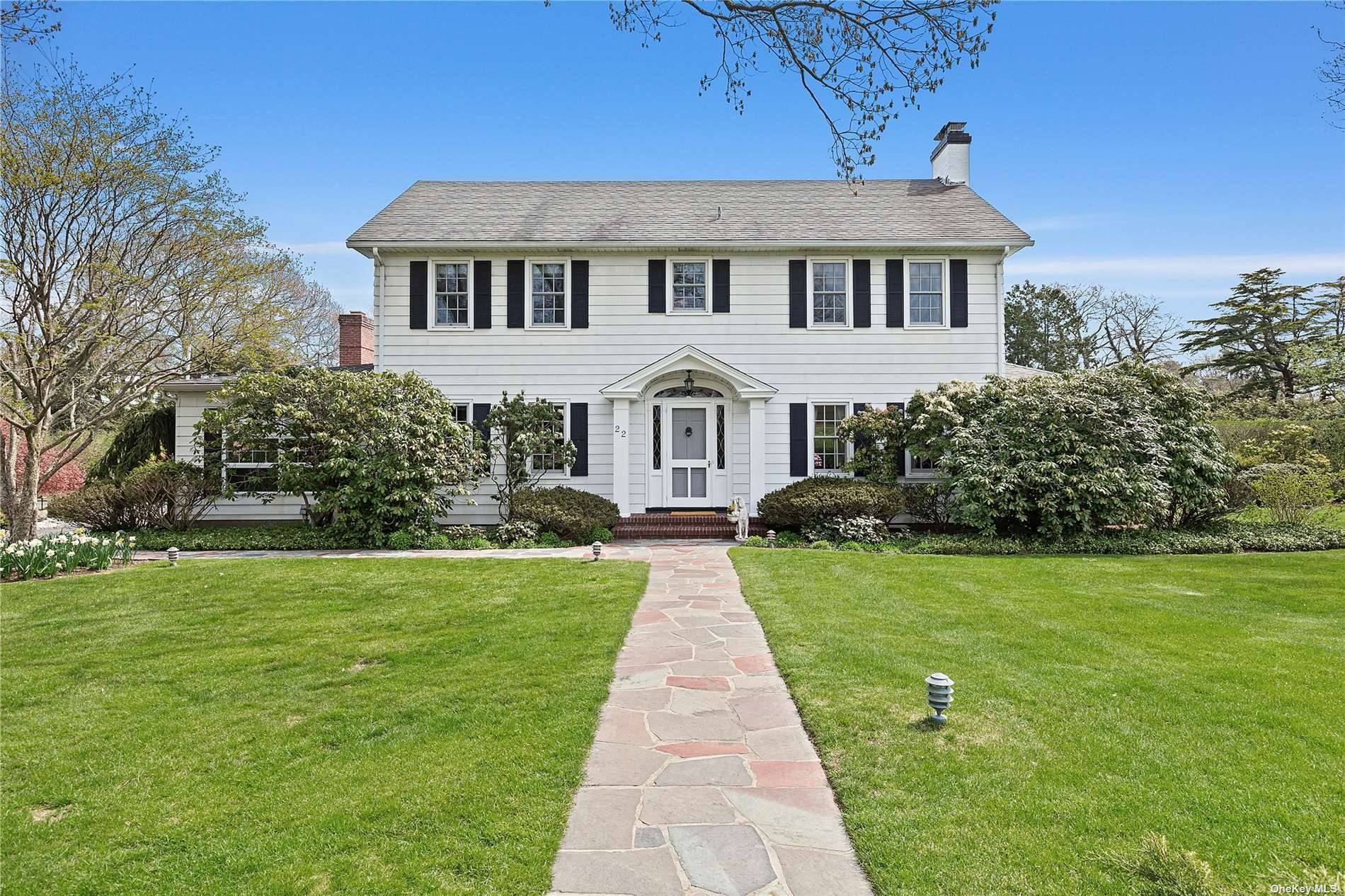 Moments from premier oceanfront beaches and the Village of Westhampton Beach sits an impeccably maintained and most elegant Traditional Hampton's home.