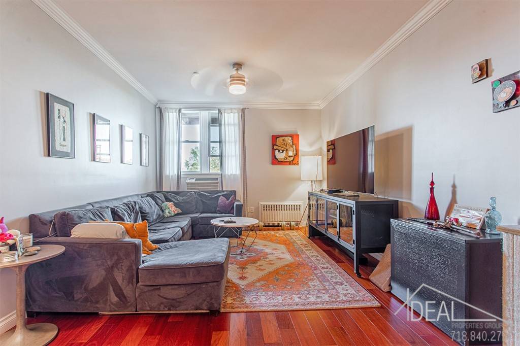 Welcome home to this spacious and bright three bedroom condo apartment with deeded parking space in Greenwood Heights.