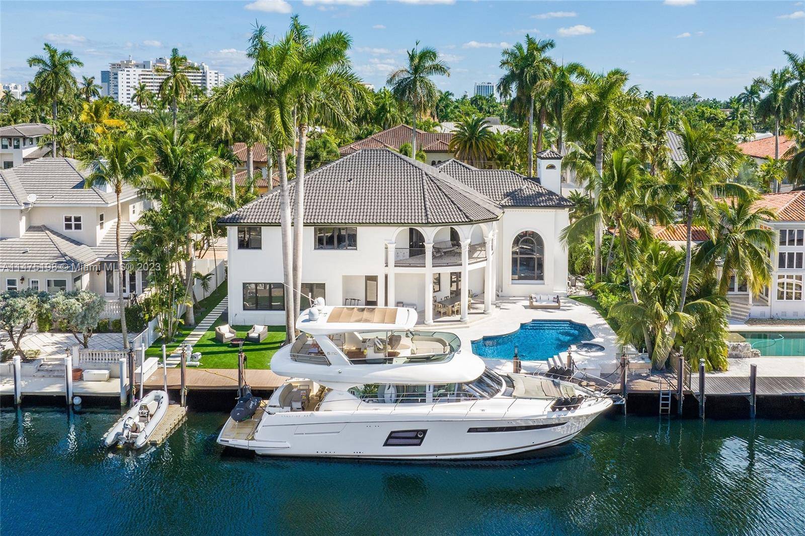 Welcome to this sophisticated and fully renovated waterfront estate, boasting 100 feet of deep water frontage that is sure to take your breath away !