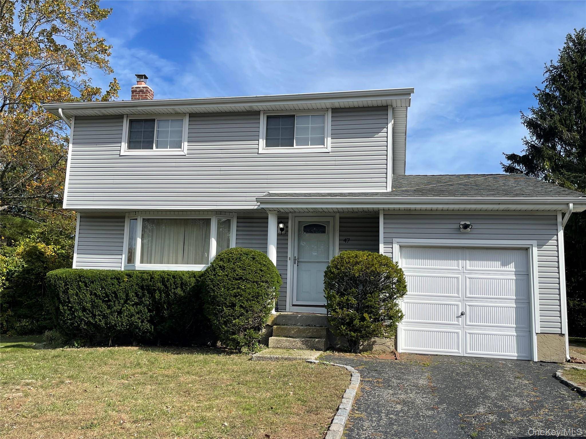 Solid and strong 3 bedroom, Colonial home with attached 1 car garage.