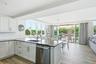 Updated kitchen overlooking the dining/living areas