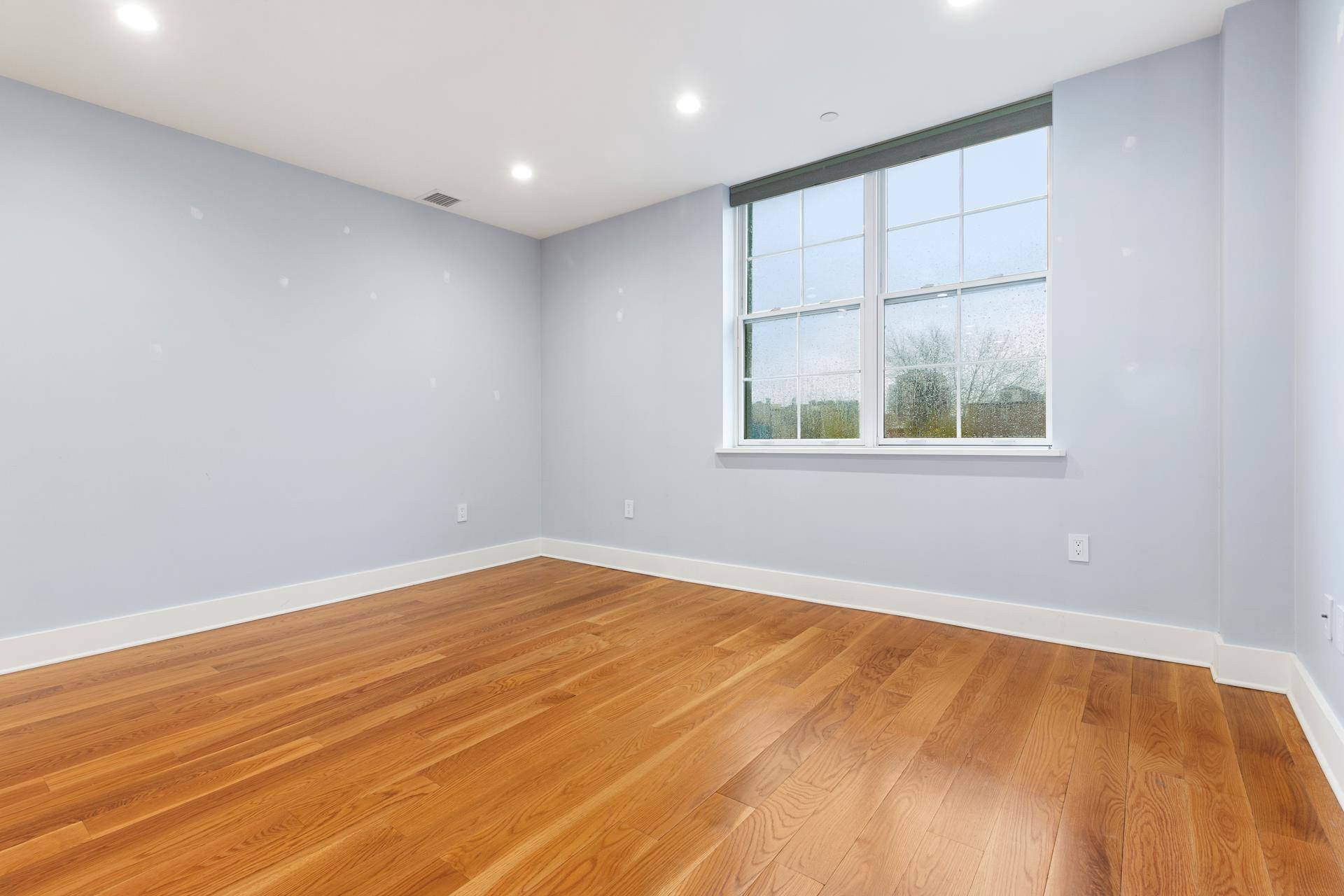 Residence 503 is a spacious two bedroom home with oversized windows and wide plank wood flooring throughout.