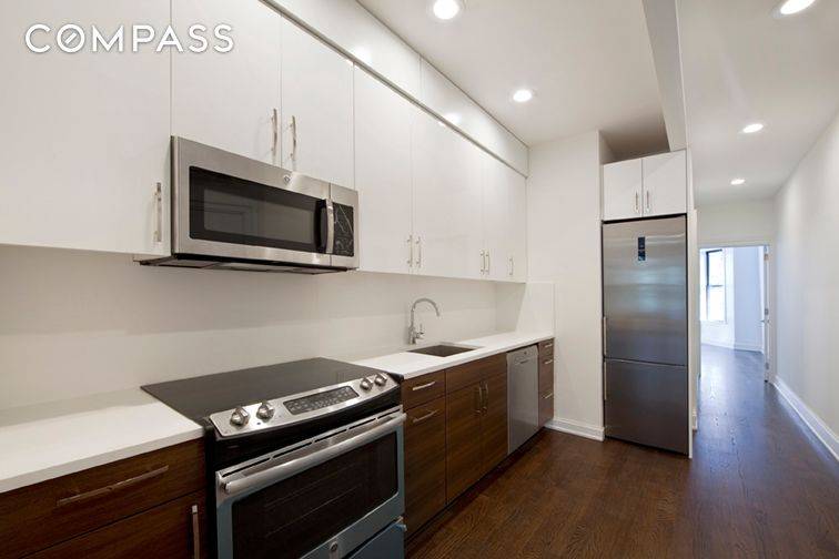 Inside this beautifully renovated convertible 2 bedroom 2 full bath apartment you ll find hardwood floors throughout, central A C, and customs closets.