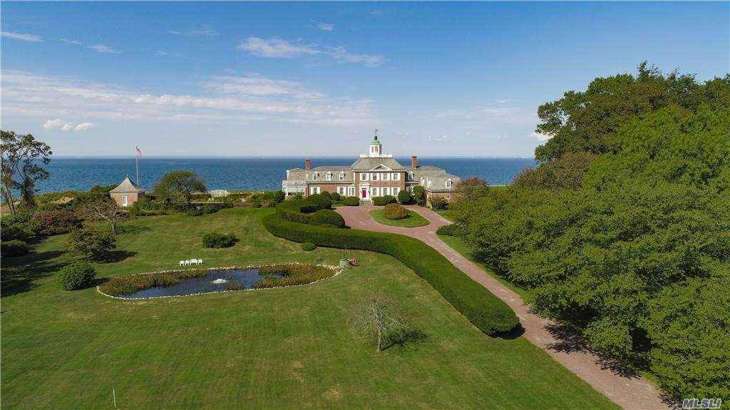 SOMERSET. Inspired by the Governor's Palace in Williamsburg, VA, this notable estate was completed in 1935 and remains a crown jewel of Long Island's fabled North Shore.