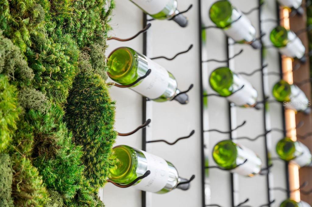 Biophyllic greenwall and wine display, complete with Thermador™ wine tower