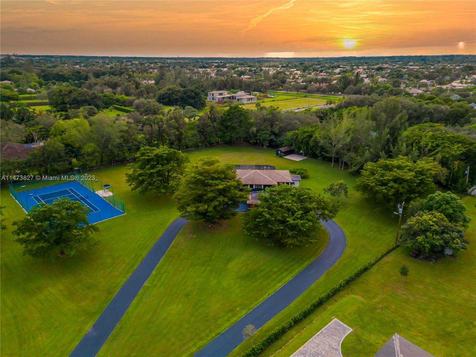 Welcome to your private oasis on Thoroughbred Lane in coveted Southwest Ranches.