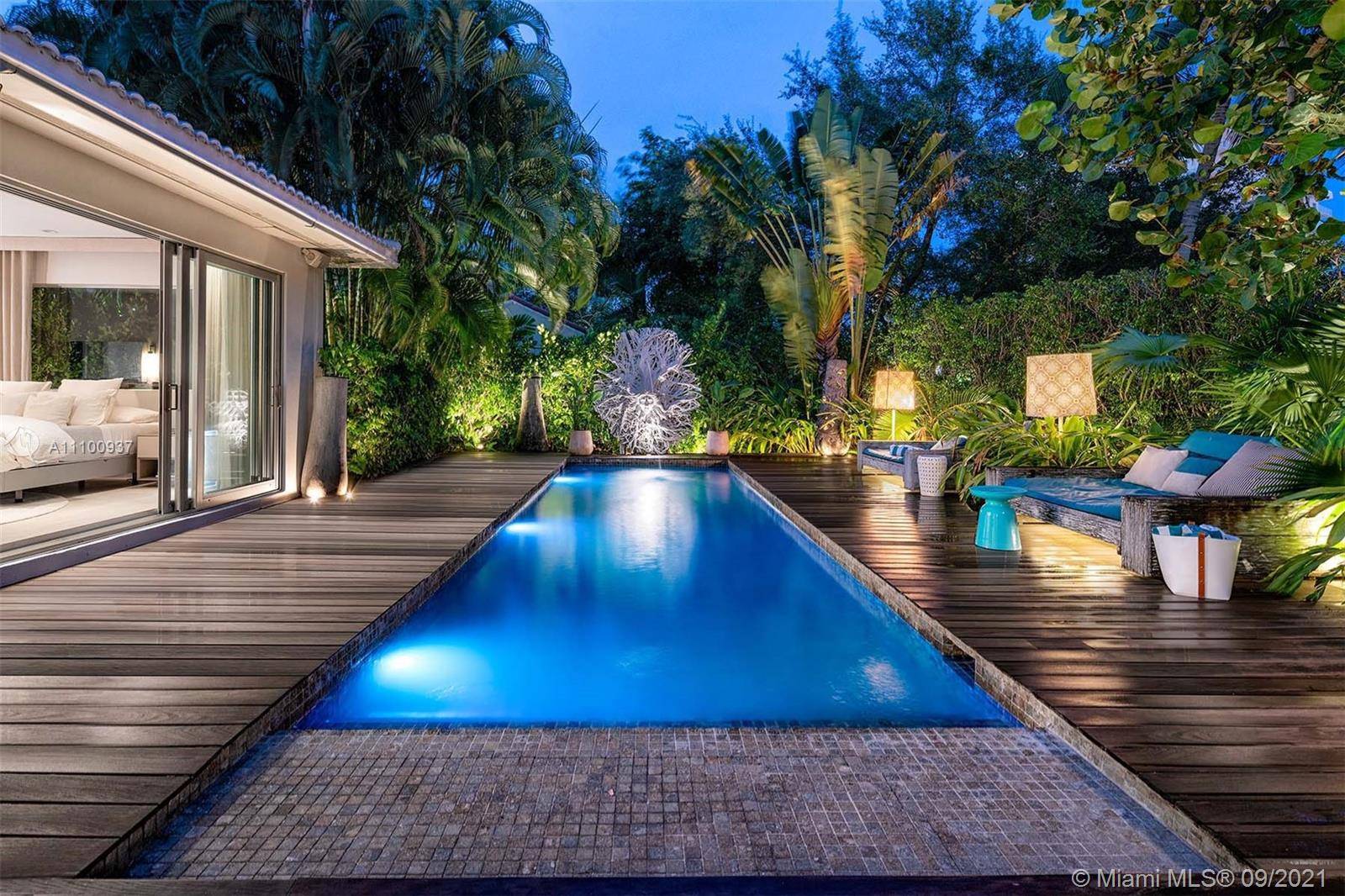 Welcome to this one of a kind private beach home only a short stroll away from the ocean, scenic boardwalk, the famous Lincoln Road, as well as many great restaurants ...