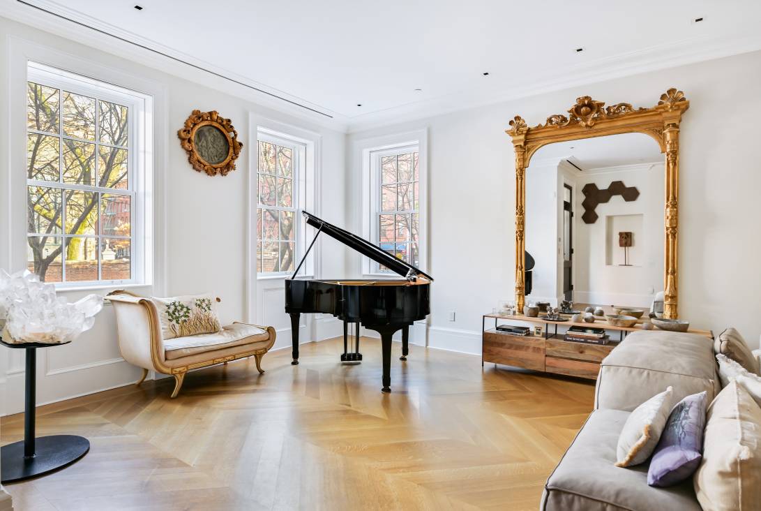 Gorgeous and supremely rare sun filled mansion facing North on Prince Street located in coveted SoHo.