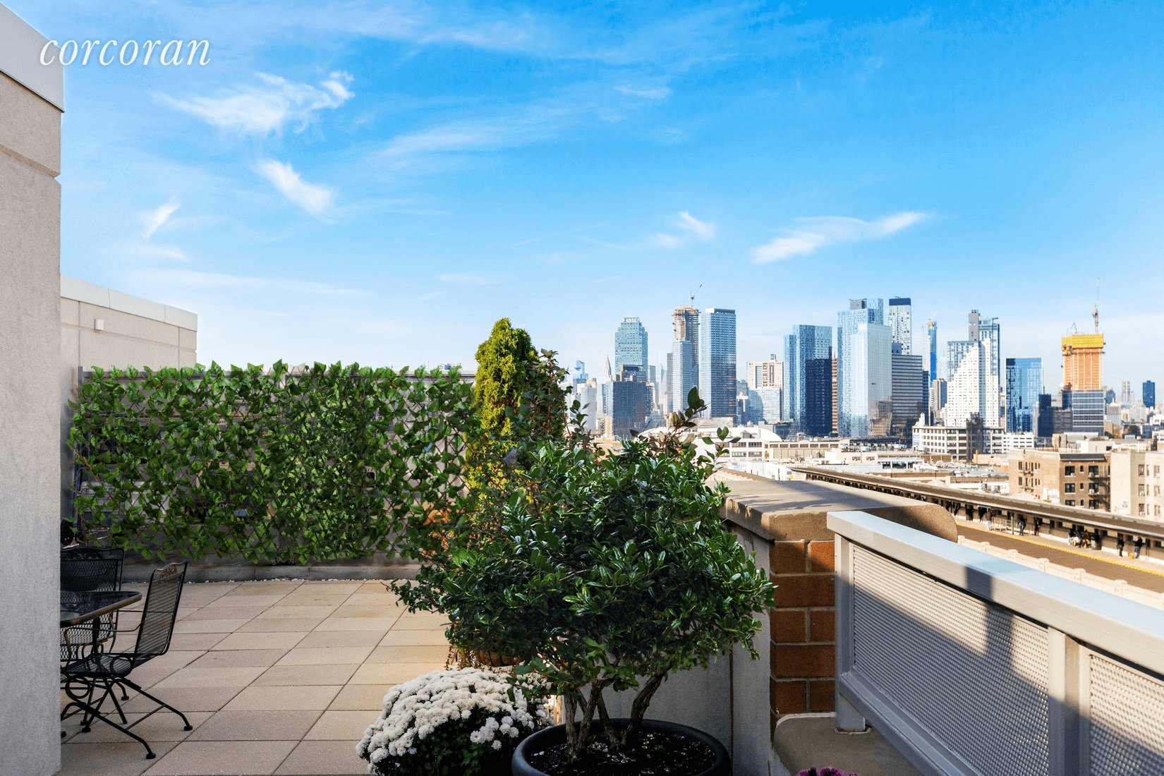 Penthouse 6B at The Phoenix Condominium features a spacious two bedroom, two bathroom layout as well as a massive private terrace with unobstructed Manhattan views.