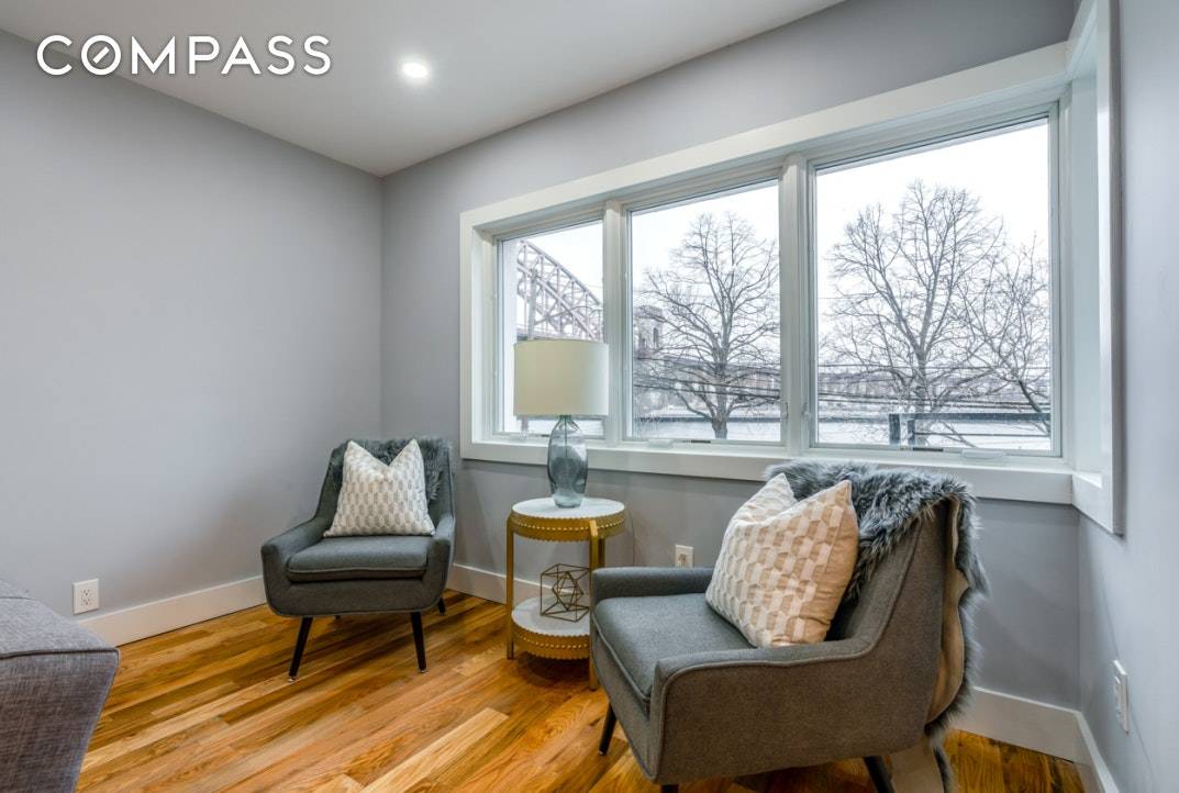 Soak in the stunning water views from your private balcony overlooking the Hellgate Bridge.