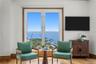 Primary bedroom sitting area — marina and Pier views