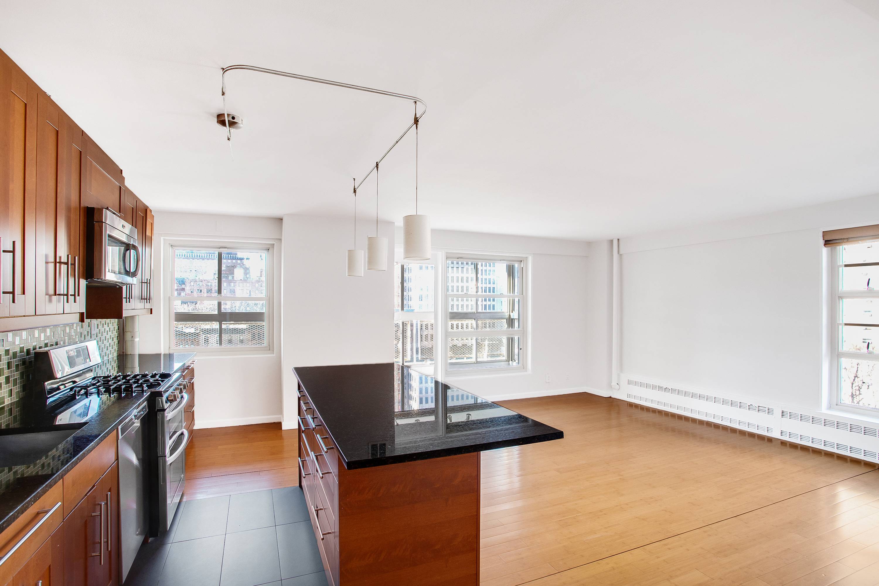 Live the Manhattan lifestyle of your dreams in this wonderful two bedroom home with huge enclosed balcony.