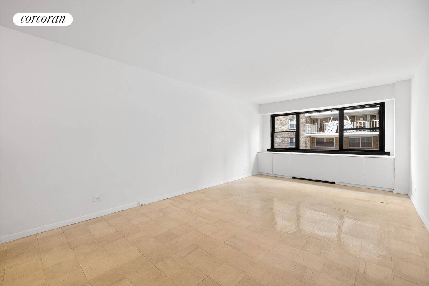 Welcome to this spacious one bedroom residence in a full service Upper East Side cooperative, offering exceptional quiet and comfort.