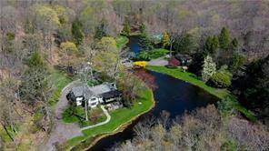 The Ultimate in Privacy An Entertainers Haven A once in a lifetime opportunity ; nearly twenty five acres of private countryside living with five acres of flowing lakes, stone bridges ...