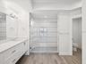 Primary bath has private water closet/