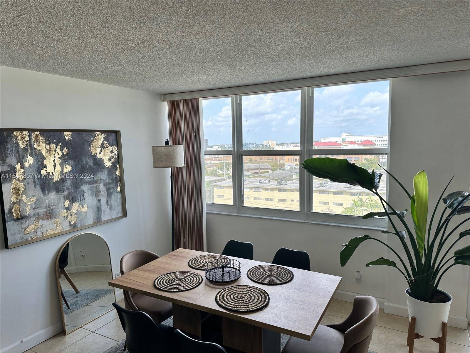 Bright and spacious 2BD 2BA corner condo unit at Bayview Towers with water views of the bay intracoastal waterway as well as city skyline views.